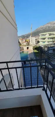 a balcony with a view of a body of water at Apartment Verde in Bar