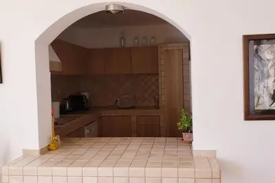 an archway in a kitchen with a tile floor at Luxury place with a magnificent view in Budva