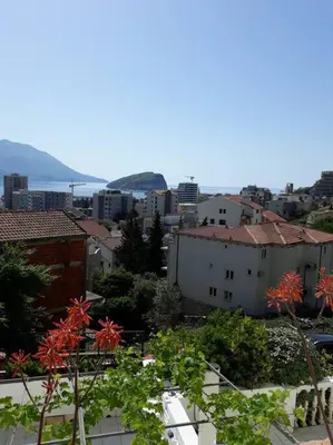 a view of a city with buildings and trees at Luxury place with a magnificent view in Budva
