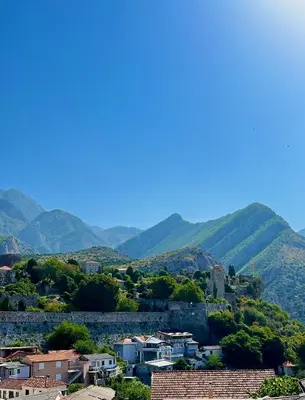 a view of a town with mountains in the background at Old Town Bar Apartments in Stari Bar