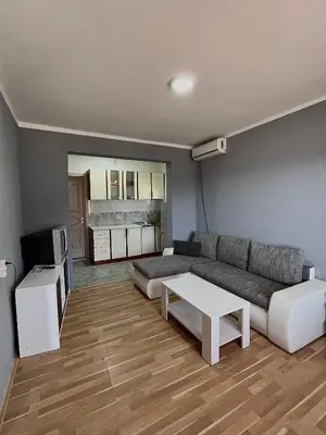 a living room with a couch and a table at Old Town Bar Apartments in Stari Bar