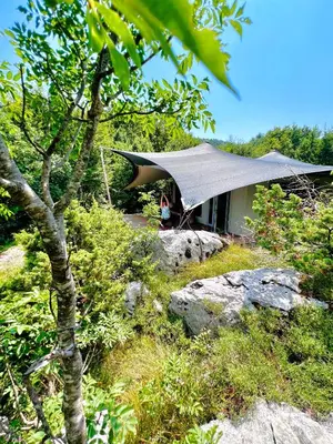 a house with a tarp on top of it at Ashuma Retreat in Cetinje