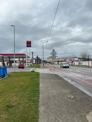 a gas station on the side of a road at Selena apartment in Podgorica