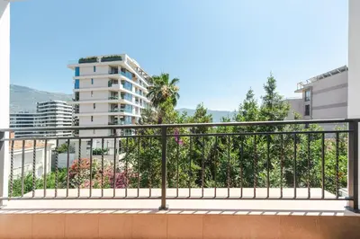 a balcony with a view of a city at Apartments Mara Lux in Budva