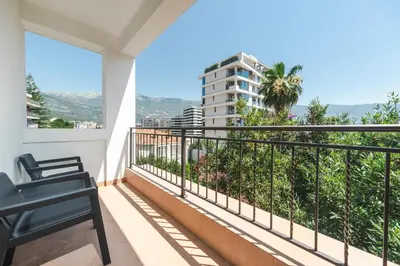 a balcony with a view of a building at Apartments Mara Lux in Budva