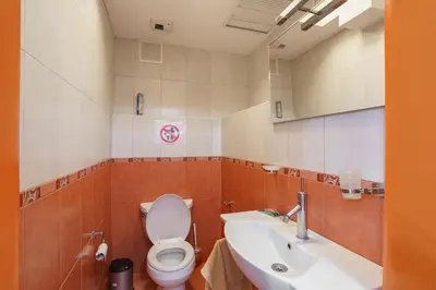a bathroom with a toilet and a sink at Golden bay in Bar