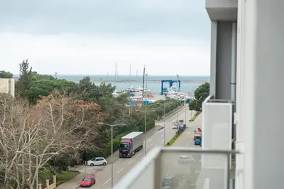 a view from a balcony of a road with vehicles at Luxury AMAAA Apartment in Bar