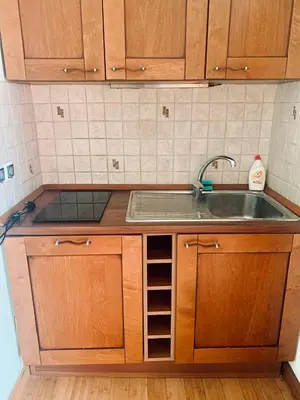 a kitchen with a sink and a counter top at Dream Apartments in Dobra Voda