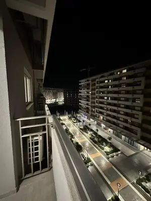a view of a large building from a balcony at Apartman VT 2 Central point in Podgorica