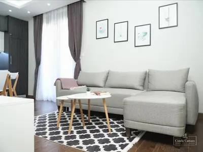 a living room with a couch and a table at Condo Cattaro in Kotor