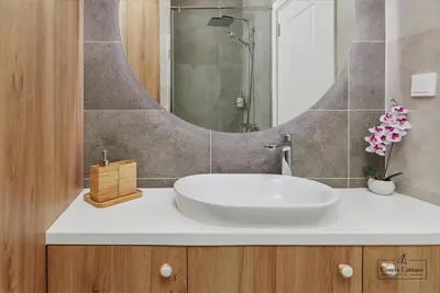 a bathroom with a sink and a mirror at Condo Cattaro in Kotor