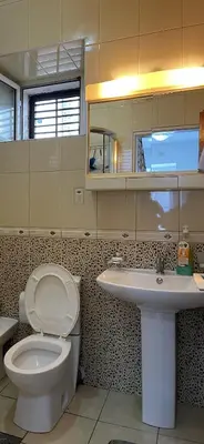a bathroom with a toilet and a sink at Aprtmani centar 2 in Ulcinj