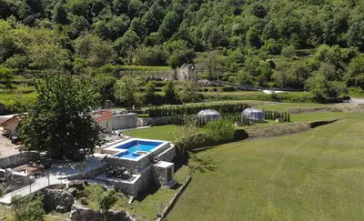 an aerial view of an estate with a swimming pool at ZEN Relaxing Village in Cetinje