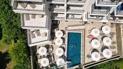 an overhead view of a hotel with a swimming pool at Hotel Pima Budva in Budva