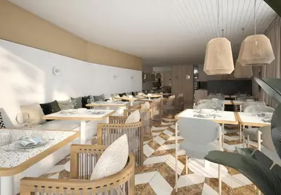 a dining room with tables and chairs at Hotel Pima Budva in Budva