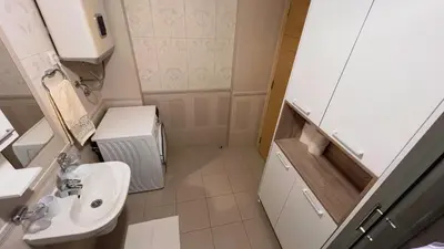 a small bathroom with a sink and a toilet at Apartment Ra Przno Budva in Budva