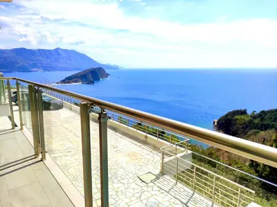 a view of the ocean from a balcony at Skyline View Apt & Pool Retreat in Budva