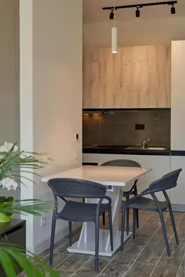 a kitchen with a table and two chairs at Skyline resort in Becici