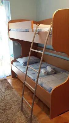 two bunk beds with a stuffed animal on the bottom bunk at Firenze Apartments in Ulcinj