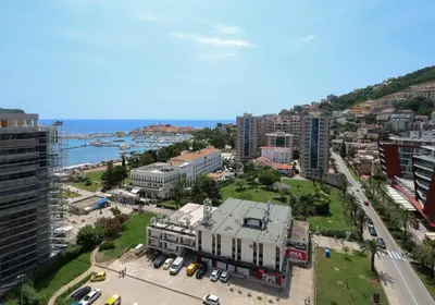 an aerial view of a city with a building at Apartments Lux in Budva