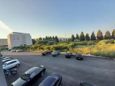 a group of cars parked in a parking lot at Apartment Long beach in Ulcinj