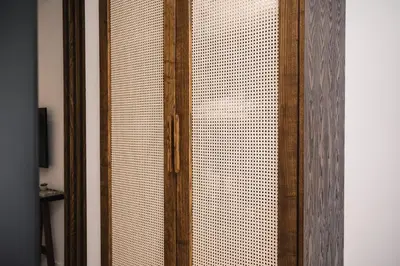 a wooden door with a mesh screen on it at KAAB Boutique Hotel in Ulcinj