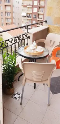 a balcony with a table and chairs on a balcony at Diva Petra Apartments in Budva