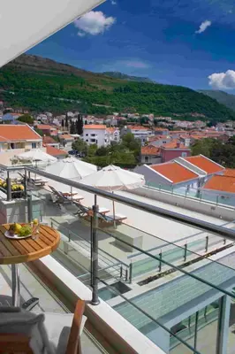 a view of a city from the roof of a building at Monte Casa SPA & Wellness in Petrovac na Moru