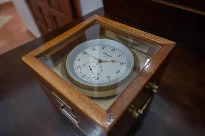 a clock in a wooden box on a table at Main Square View in Kotor