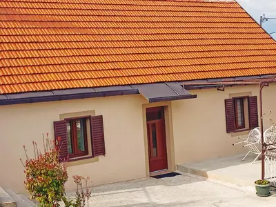 a house with an orange roof at Holiday in the National park Lovcen in Cetinje