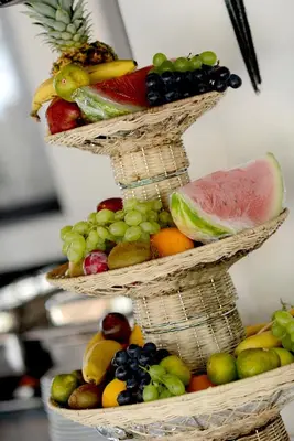 three baskets filled with different types of fruit at Hotel Sanja former Oliva in Budva