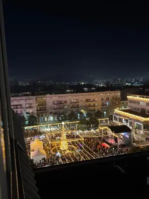 a carnival in a city at night at Stan u strogom centru grada in Podgorica