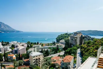 a view of a city with the ocean in the background at Budva Gate in Budva