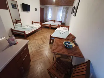 an overhead view of a living room with a table and chairs at Old Town - Guest House in Stari Bar