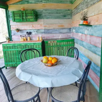 a table with a bowl of fruit on it at RAINBOW HOME in Gornji Štoj