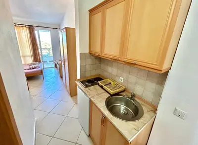 a kitchen with a sink and a counter top at Romantica Apartments in Ulcinj