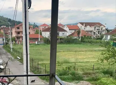 a view of a field of houses from a window at NIKOLA studio in Podgorica