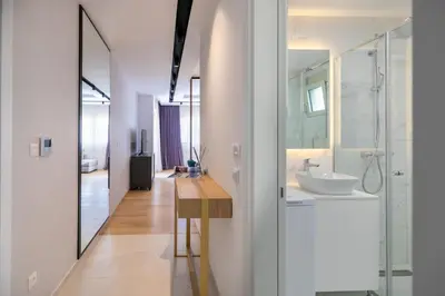 a bathroom with a sink and a mirror at Adriatic Dream Apartment Becici in Budva