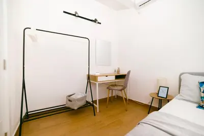 a bedroom with a mirror and a desk at The Rooftop of Apartments Lungo Mare in Ulcinj