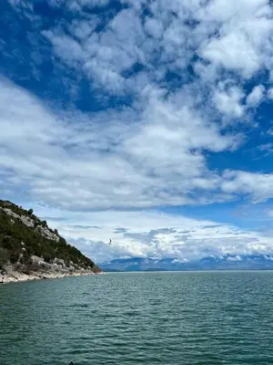 a large body of water under a cloudy sky at Lakeview Apartments Jolicic in Virpazar