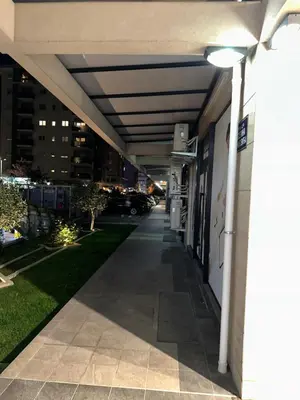 a hallway of a building with a street light at Thousand Roses in Podgorica