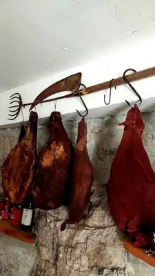 a group of bags hanging on a wall at Vinogradina Eco Vukčević in Virpazar