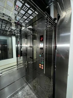 a metal elevator in a subway train with at French Mood in Dobra Voda